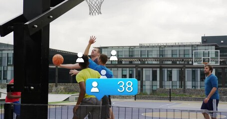 Group of five men playing basketball on court, showing blue notification icon in technology scene - Powered by Adobe