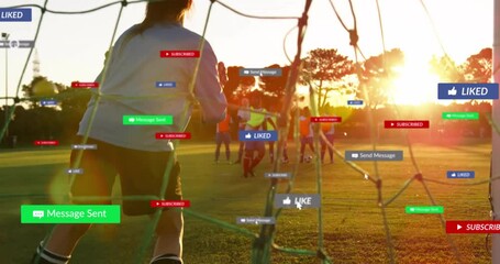 woman goalkeeper guarding penalty area at sunset showcasing sports marketing with floating likes