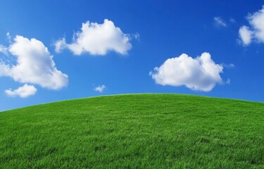Naklejka premium Green Hill Under a Blue Sky with White Clouds