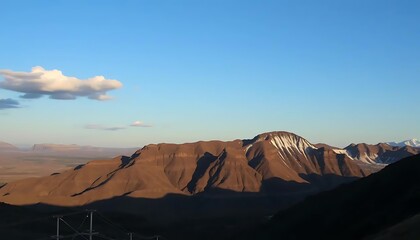 Naklejka premium Scenic highlands landscape view featuring majestic mountains and a bright blue sky