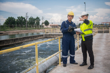 A professional inspector and a water treatment plant engineer are working together to check whether...