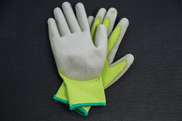 Protective gloves made of Polyester PVC,