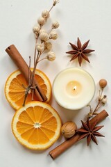 Fototapeta premium Aromatic Candle with Citrus Slices, Cinnamon Sticks, and Star Anise, Creating a Cozy and Inviting Atmosphere