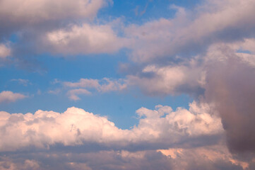 Dramatic sunset sky with clouds.