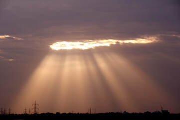 Dramatic sunset sky with clouds.