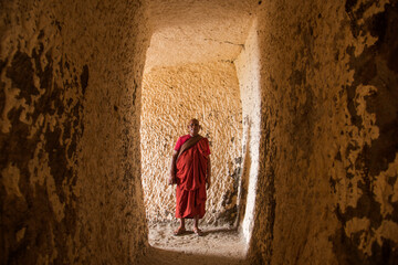 Buddhist monk visit to the Aurangabad Caves, India.