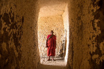 Buddhist monk visit to the Aurangabad Caves, India.