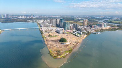 Obraz premium The Sydney suburb of Wentworth point with barriers on the Parramatta river to prevent pollution during construction.