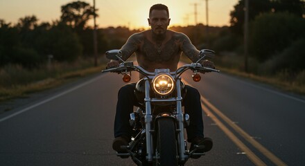Tattooed biker rides into the sunset