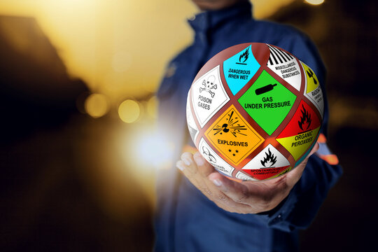 Dangerous goods sign with safety staff holding a ball to encourage beware accident when working with hazardous substance in chemical industries - Powered by Adobe