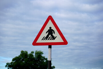 Road sign on highway, India.