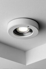LED downlight fixture embedded in white ceiling background for clean, minimal, and efficient interior lighting