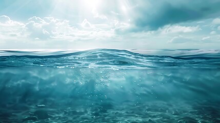 Underwater View Showing Water Surface With Sun Rays Through Cloudy Sky