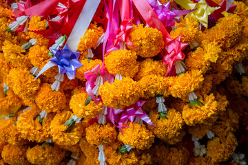 Phuang malai or traditional Thai floral garlands that symbolize respect, luck.