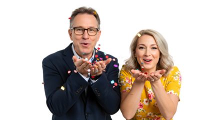 Middle-Aged Couple Blowing Confetti in Celebration on White Background
