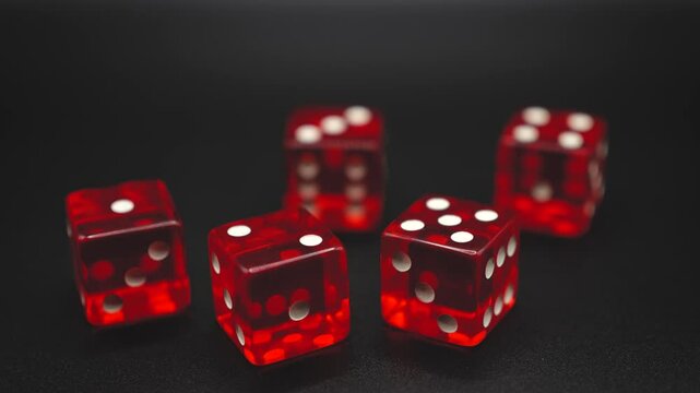Transparent beautiful dice on black canvas. Numbers in order on dice.