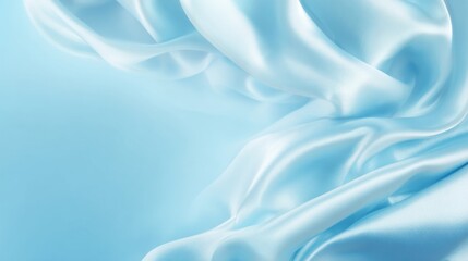 Fototapeta premium Soft Blue Silk Fabric with Diffused Light and Gentle Folds