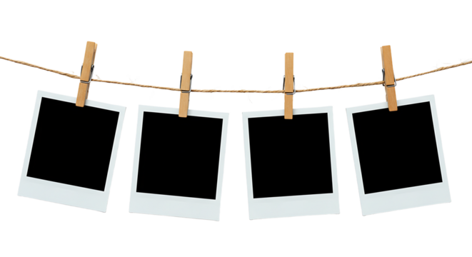 Four Empty Polaroid Photos Hanging on a String