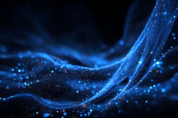 Abstract blue shimmering particles swirling in a dark background creating a dynamic and ethereal visual experience for digital artwork or design projects