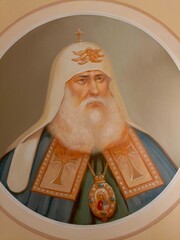 Elderly Orthodox Patriarch in Traditional Iconographic Style with Serene Expression representing Spiritual Leadership against Beige Background