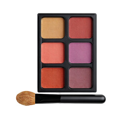 A close-up shot of an eyeshadow palette with different shades, along with a brush