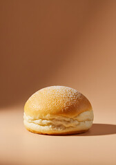 Single Bread Bun on Warm Background