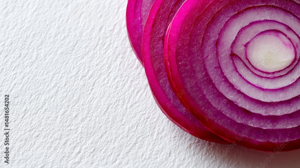 Poster top-down view showcases the vibrant concentric layers of a red onion, highlighting its detailed text