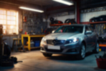 Blurry car repair shop, the car is being serviced in a garage with a dark theme, featuring a blurry repair shop background.