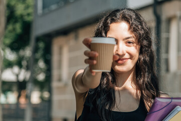 Teenage girl starting the day with a good coffee