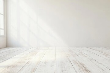 Empty, sunlit room with light wooden floor
