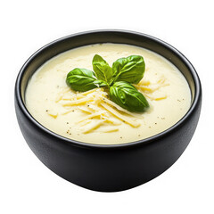 creamy soup in black bowl  