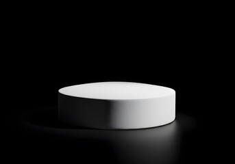 White cylindrical platform on a black background ideal for product display