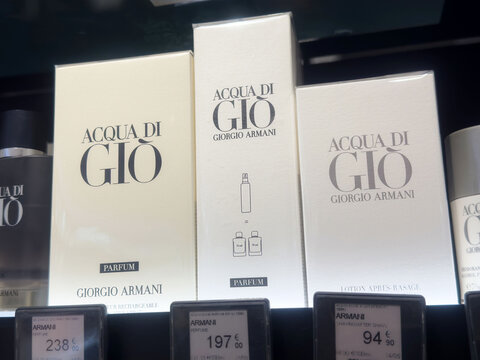 Acqua di gi&ograve; armani fragrance display with price tags at retail store