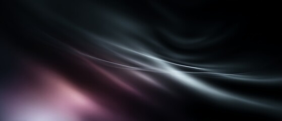 Obraz premium Black abstract background featuring soft motion blur and subtle hues.
