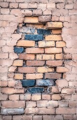old brick wall with green grass