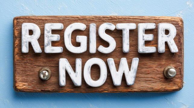 Wooden sign with bold white letters says "REGISTER NOW" on a blue background. - Powered by Adobe