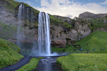 Seljalandsfoss is a waterfall in southern Iceland-You can walk behind the waterfall