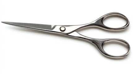 Obraz premium A pair of silver scissors rests on a plain white background.