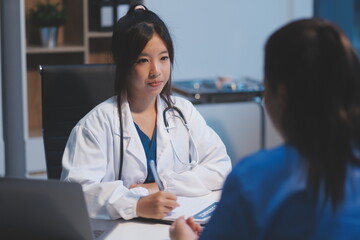 Doctor working in the office and listening to the patient, she is explaining her symptoms, healtcare and assistance concept