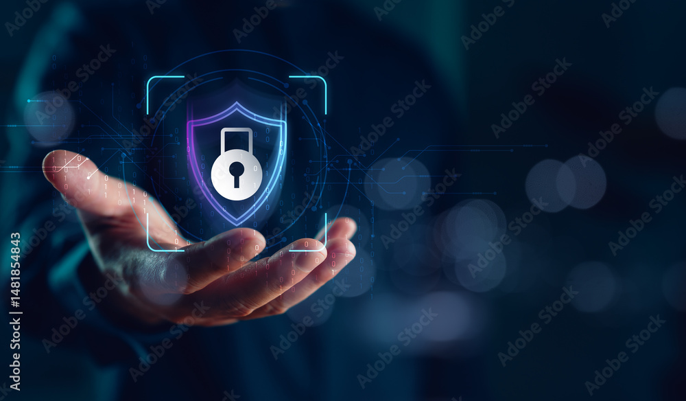 Aufkleber Cybersecurity concept with digital shield and padlock icon floating above a hand. Symbol of data protection, secure technology, and online privacy in digital transformation.