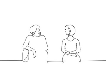 woman and man sitting side by side and looking at each other - one line art vector. man sitting relaxed and woman with straight back, they talking
