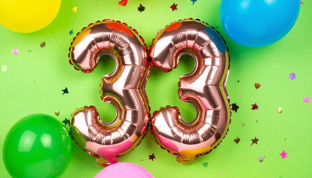 Number 33 with ballons on light green background.  