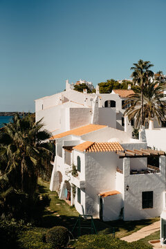 Whitewashed Mediterranean Houses with Terracotta Roofs in Fornells
