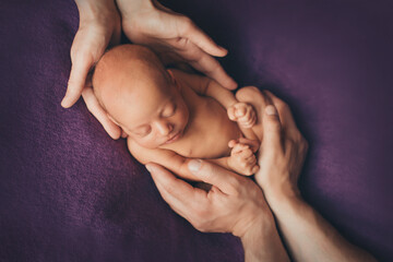 A newborn baby is wrapped in diapers with a wool cap in a basket. Swaddling, maternity hospital, family, ivf, life planning, parenting. A mother's love for her child. Baby food. High quality photo