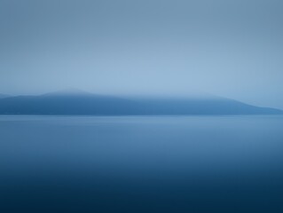 Fototapeta premium Minimalist Elegance: Dark Blue Studio Background with Blurred Fog Texture – Professional Wide-Angle Photograph in Soft Natural Light