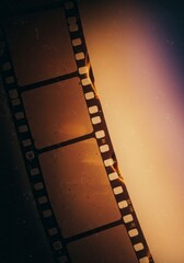 Obraz premium Abstract Background Of Burning Film Strip With Starry Sky