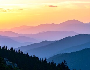 Fototapeta premium A breathtaking mountain landscape kissed by the golden sunrise transitions into a tranquil sunset veiled in soft fog and distant clouds