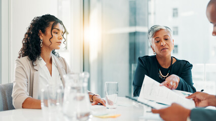 Business, meeting and people with paperwork in office for budget review, divided statement or...