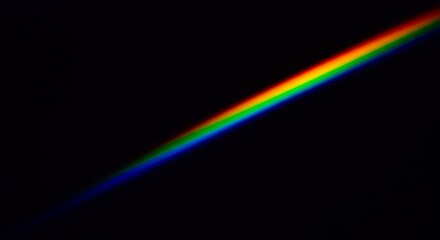 Abstract Photo of Diagonal Rainbow Spectrum on Black Background
