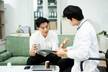 Obraz premium Caring doctor supports stressed male patient during mental health consultation on sofa. Therapy, empathy, and emotional care